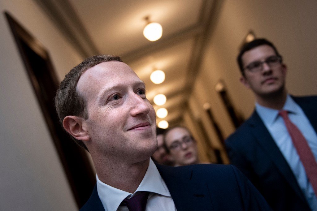 Facebook CEO Mark Zuckerberg walks to meetings for technology regulations and data security issues